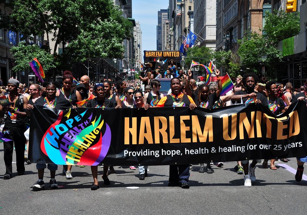 2014 NYC Harlem United marching in LGBTQIA Pride Parade on Fifth Avenue