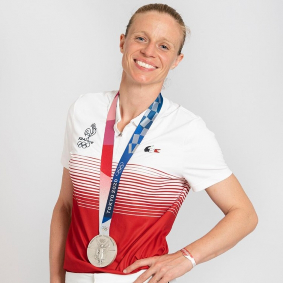 2021 had plenty of LGBTQ+ athlete vows and kisses and bears...oh, my!