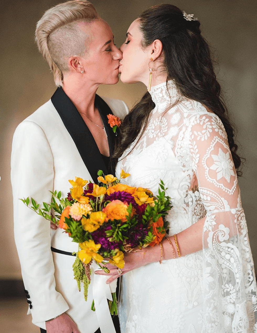 2021 had plenty of LGBTQ+ athlete vows and kisses and bears...oh, my!