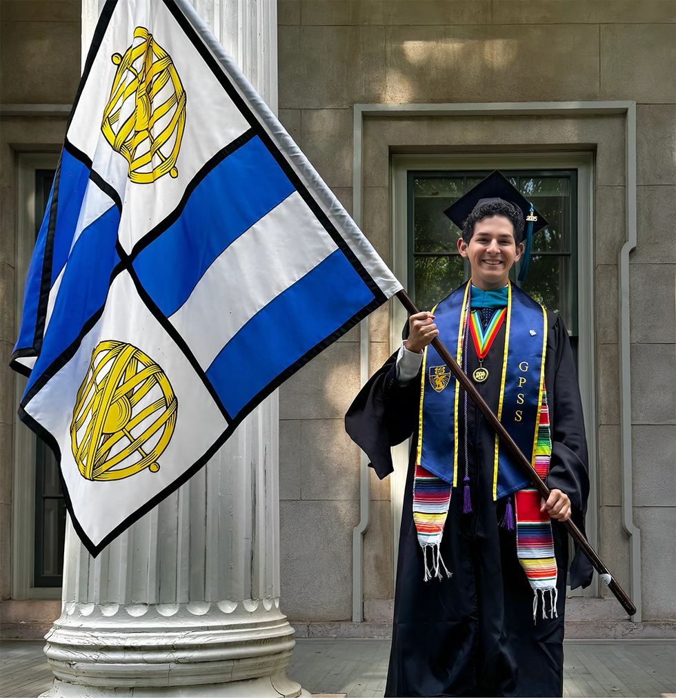 2025 Point Foundation Scholar Graduate Alejandro Sanchez Flores graduation cap gown flag