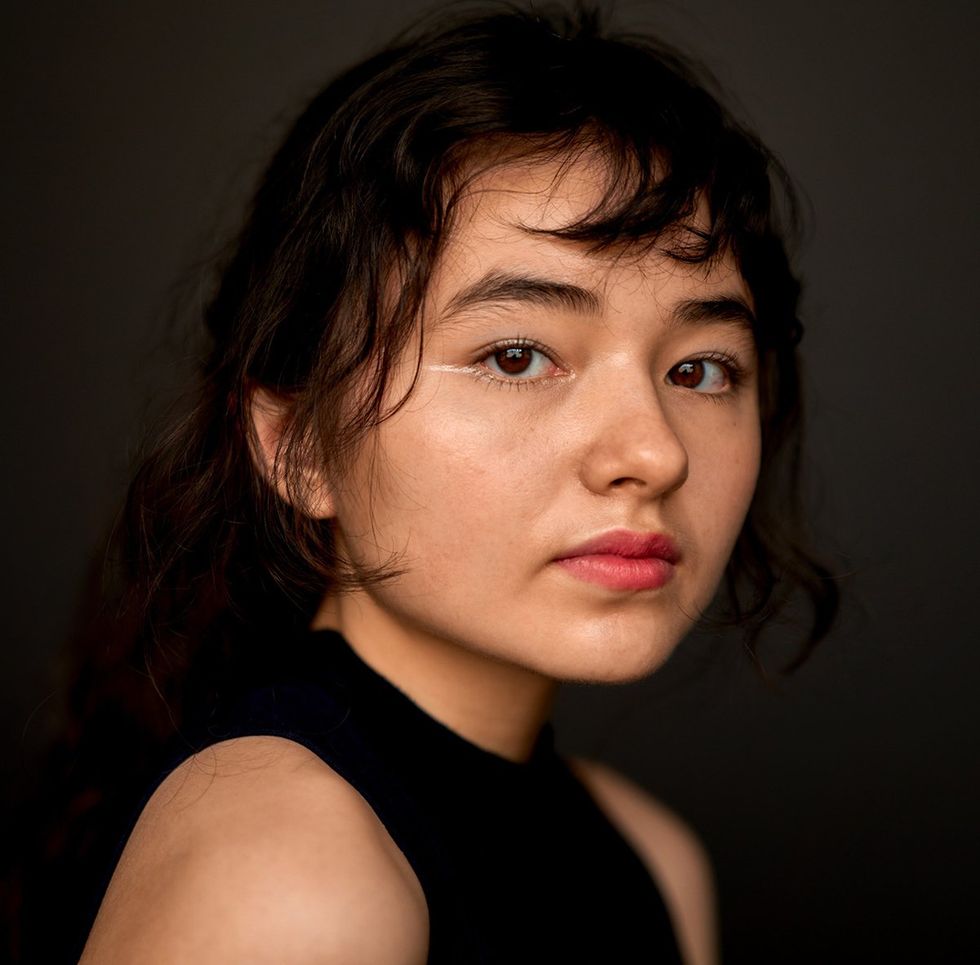 2025 Point Foundation Scholar Graduate raine yung graduation portrait