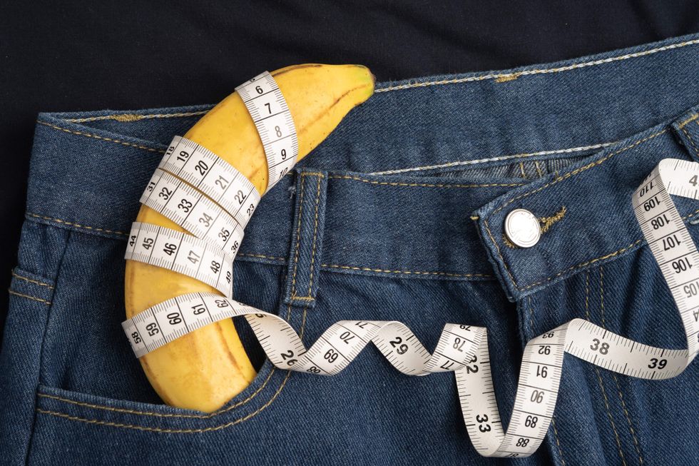 A banana in a pocket with a tape measure wrapped around it
