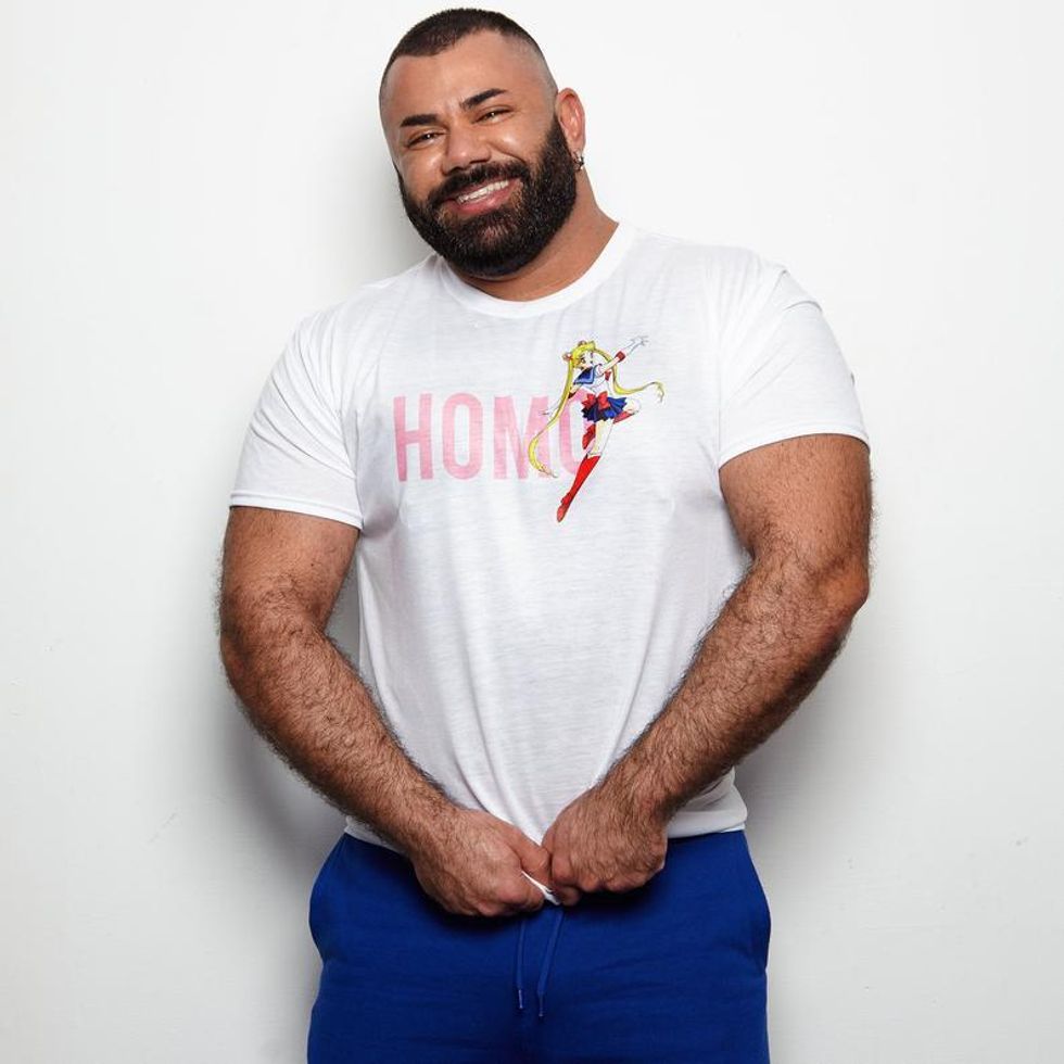 A beefy guy wearing a Sailor Moon t-shirt