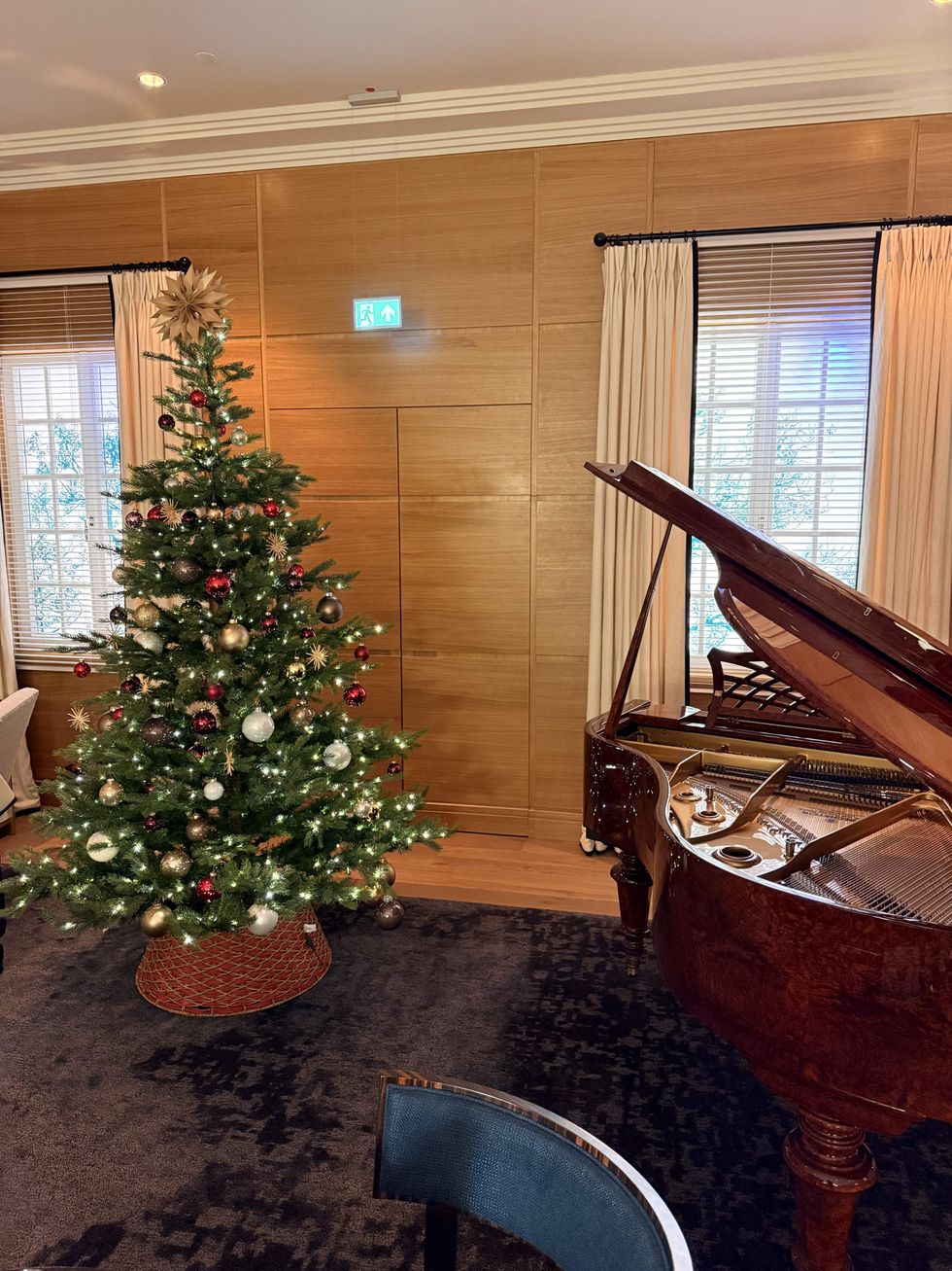 A christmas tree and a piano