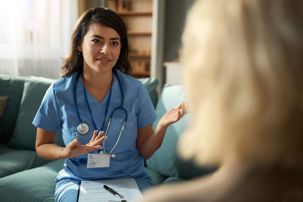 A doctor talking to a patient