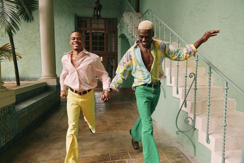 a gay couple enjoying time traveling together