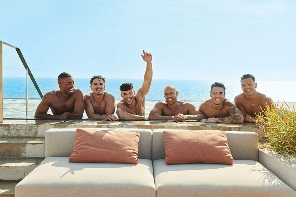 a group of shirtless mean on the pool deck at Tryst Puerto Vallarta