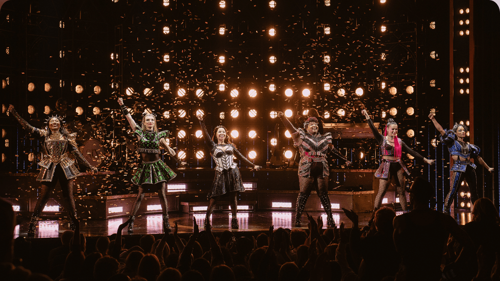A group of women performing on stage