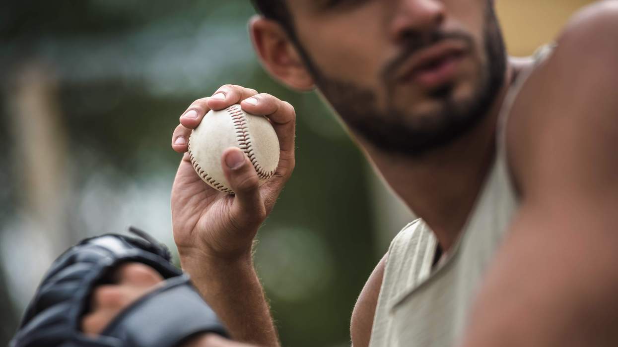 A man pitching