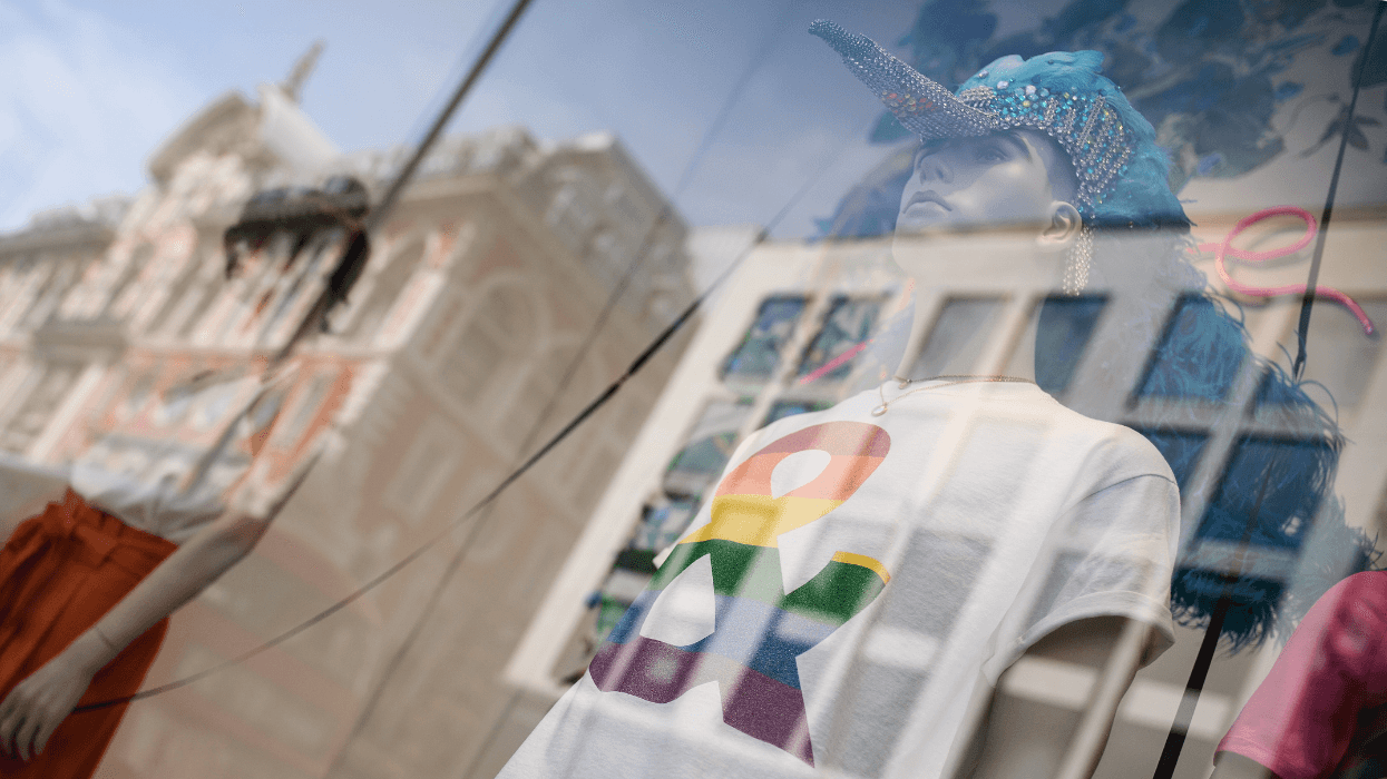 A mannequin displays an LGBTQ+ Pride shirt in a London storefront.