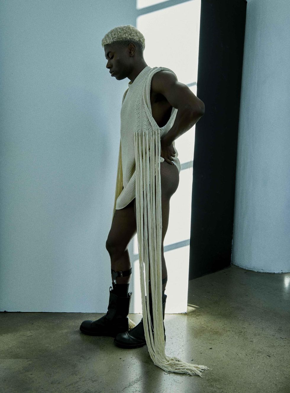 A model wearing knits.