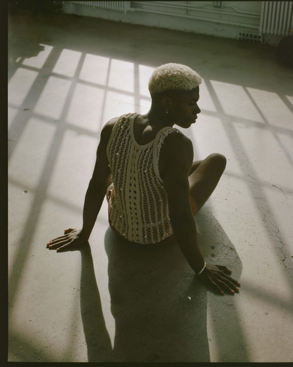 A model wearing knits.