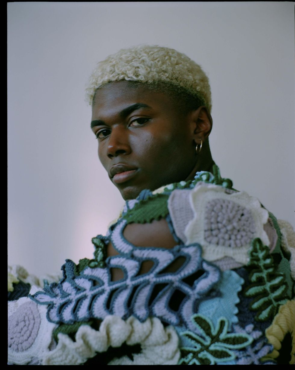 A model wearing knits.