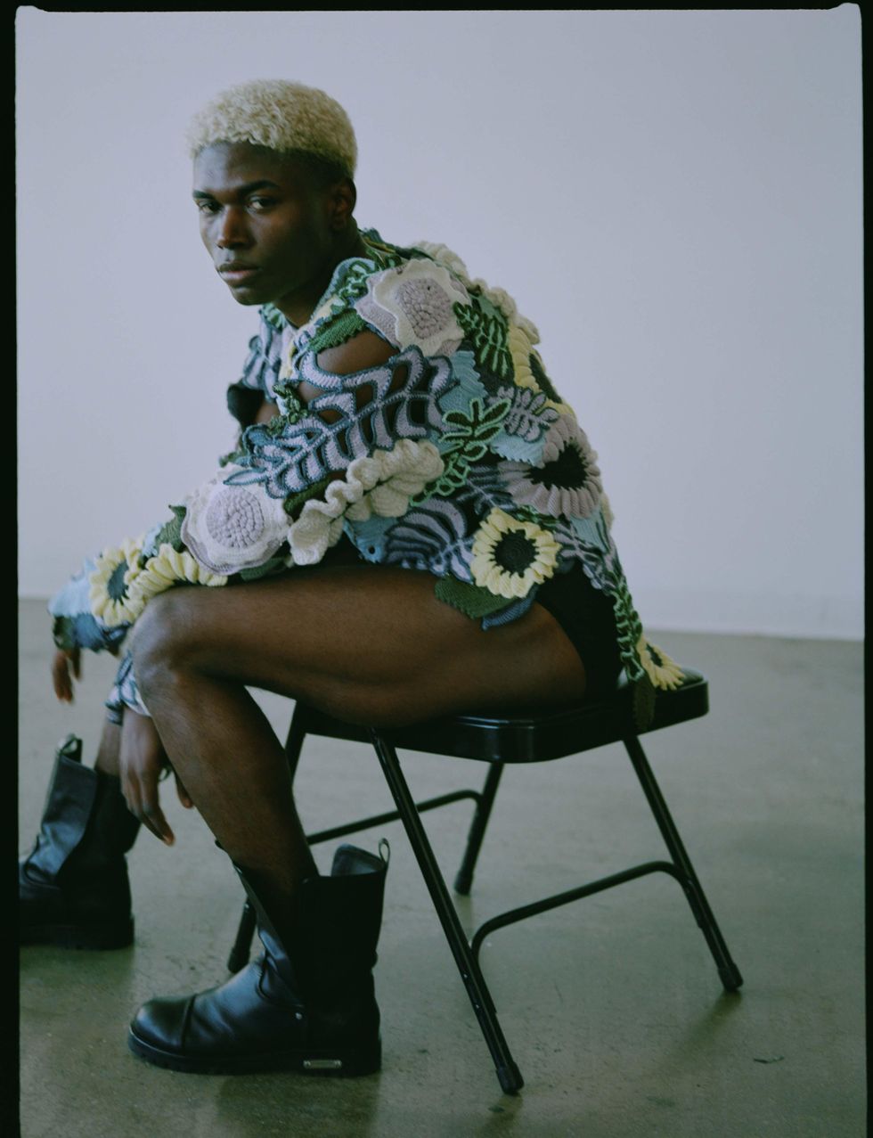 A model wearing knits.