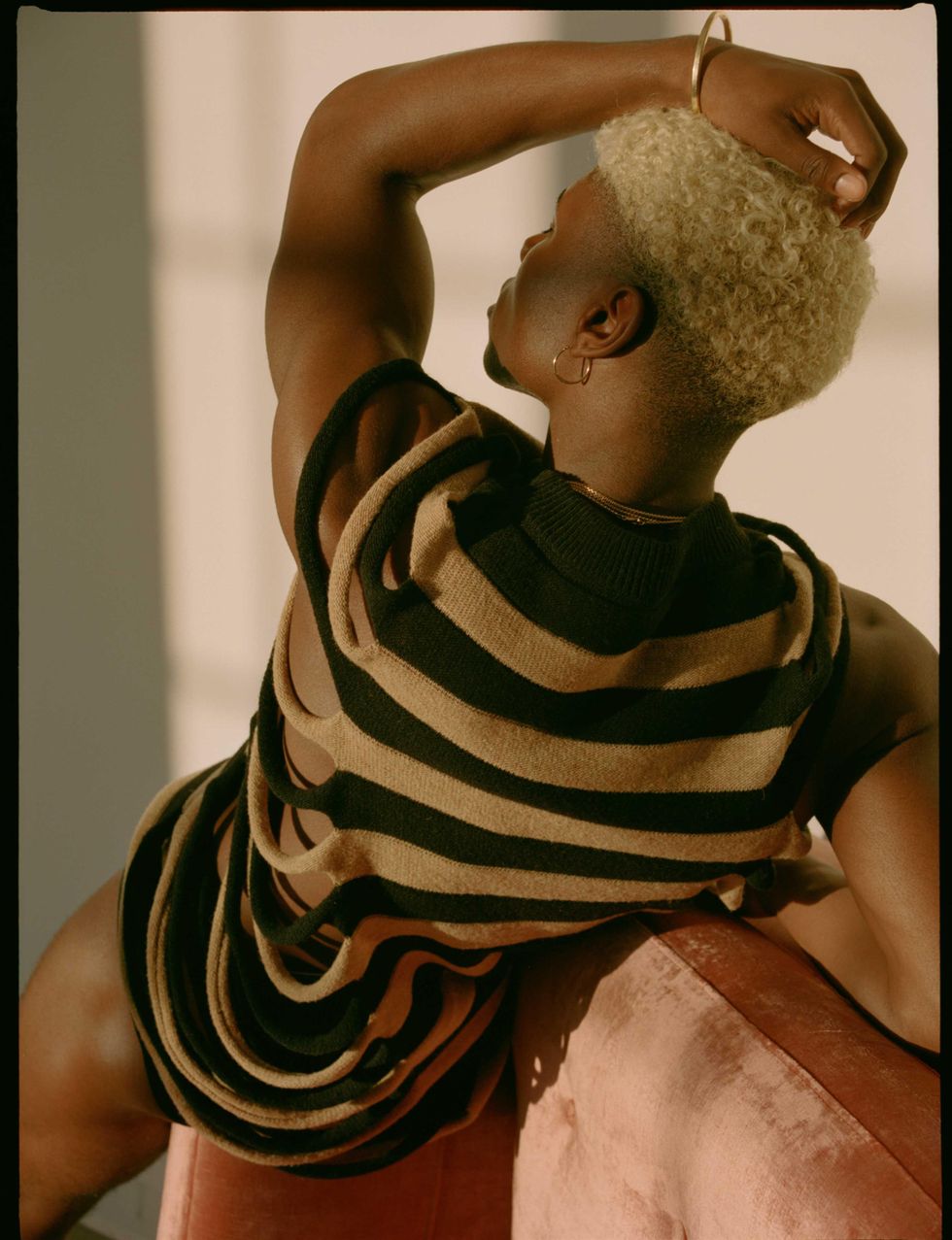 A model wearing knits.