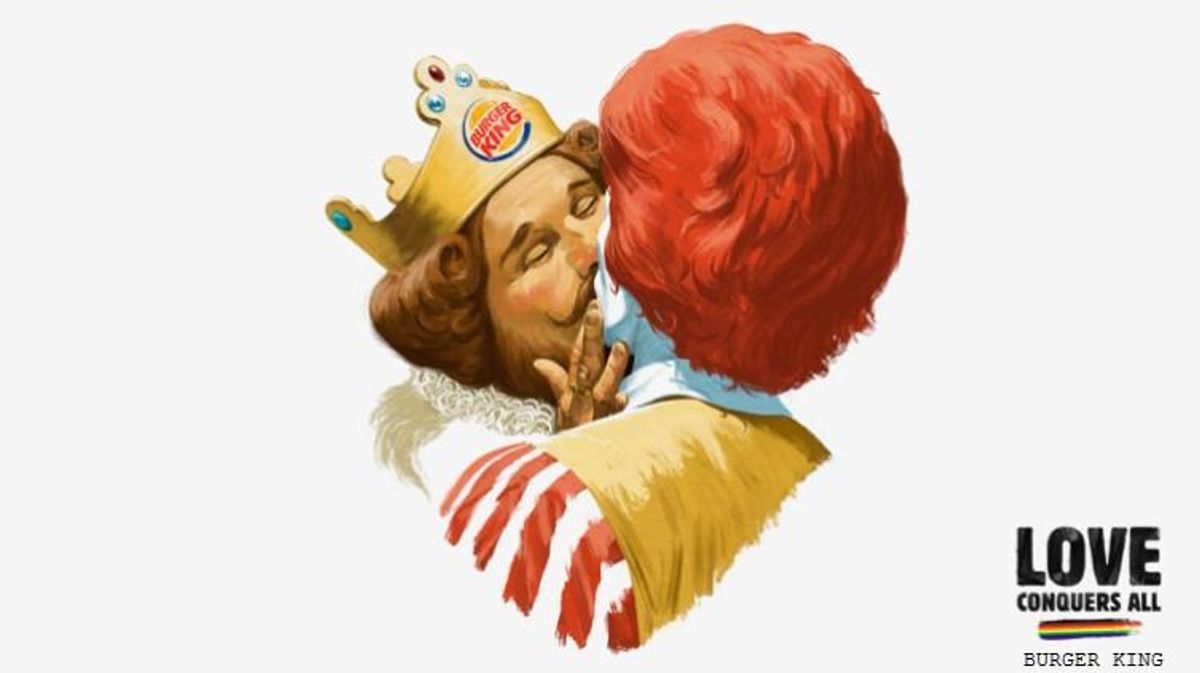 A new ad campaign by Burger King Finland shows their mascot, The King, in an epic kiss with Ronald McDonald just in time for Pride.