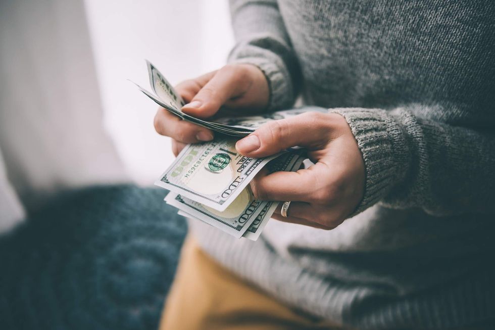 a person counting money