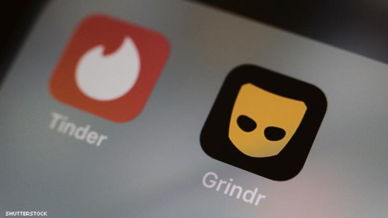 A photo of a phone looking at Grindr.
