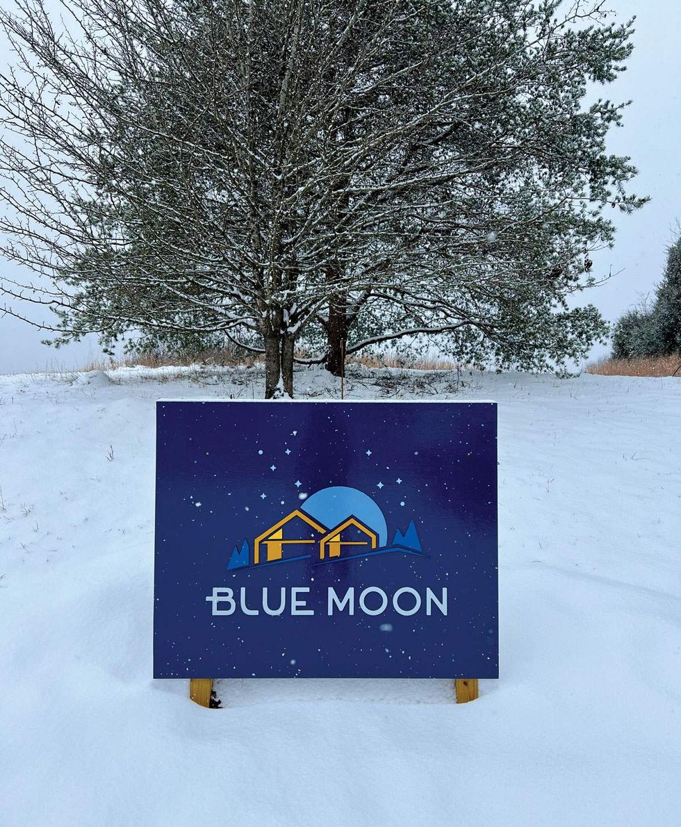 A sign greets winter guests.