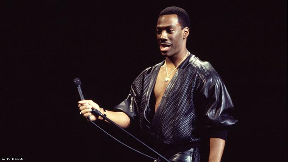 American comedian Eddie Murphy performs onstage at Madison Square Garden during his 'Raw Tour,' New York, New York, October 13, 1987. (Photo by Gary Gershoff/Getty Images)