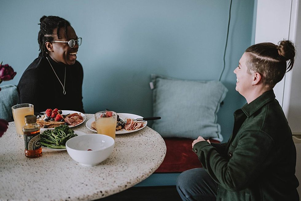 An intimate LGBTQ+ wedding proposal at an Airbnb