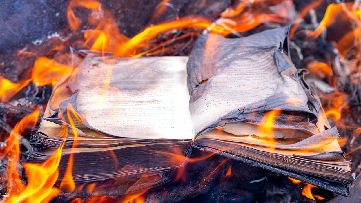 An open book on fire