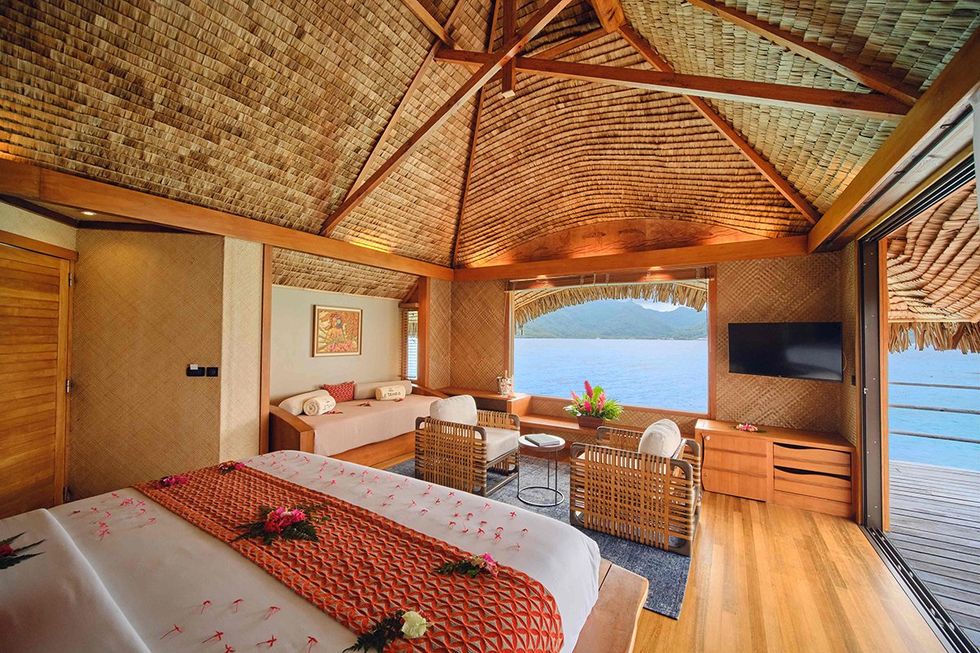 An overwater suite at Le Taha'a by Pearl Resorts