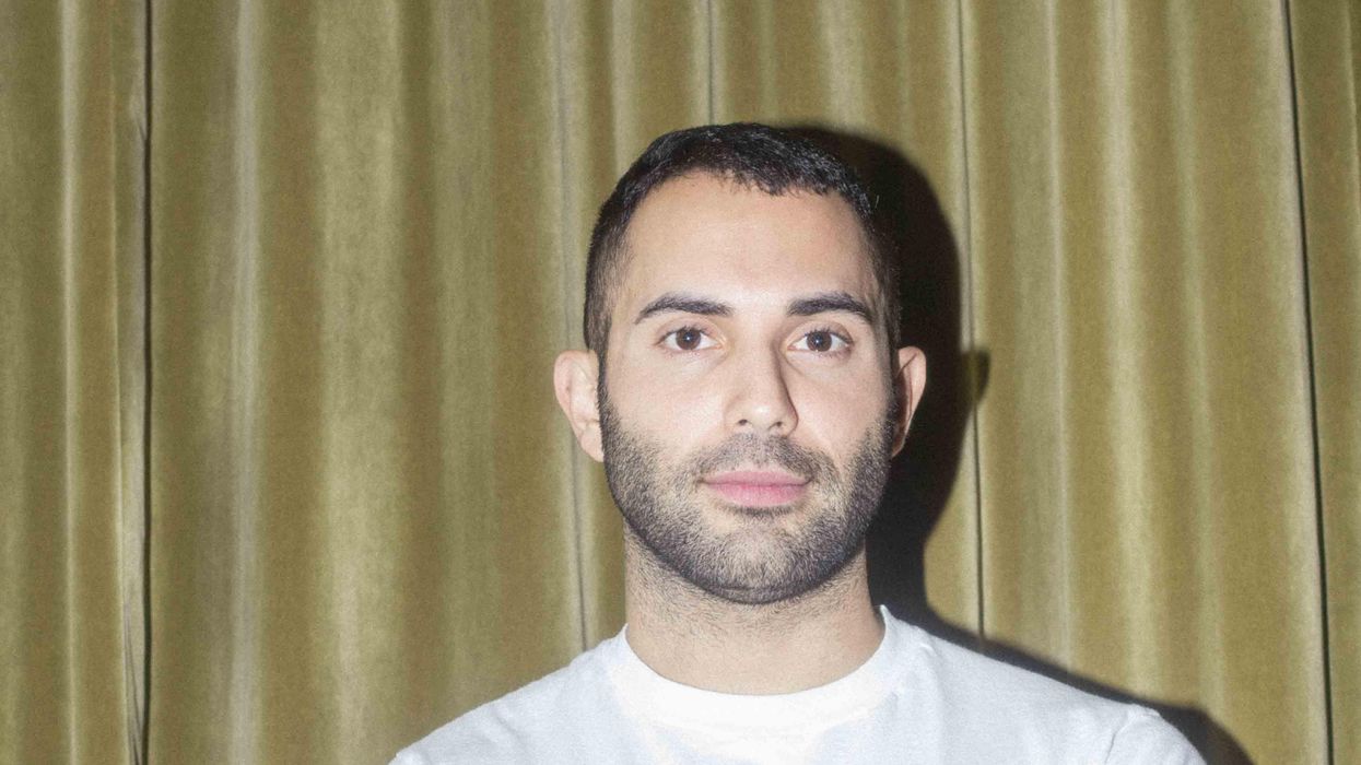 Andy Baraghani in a white t-shirt.