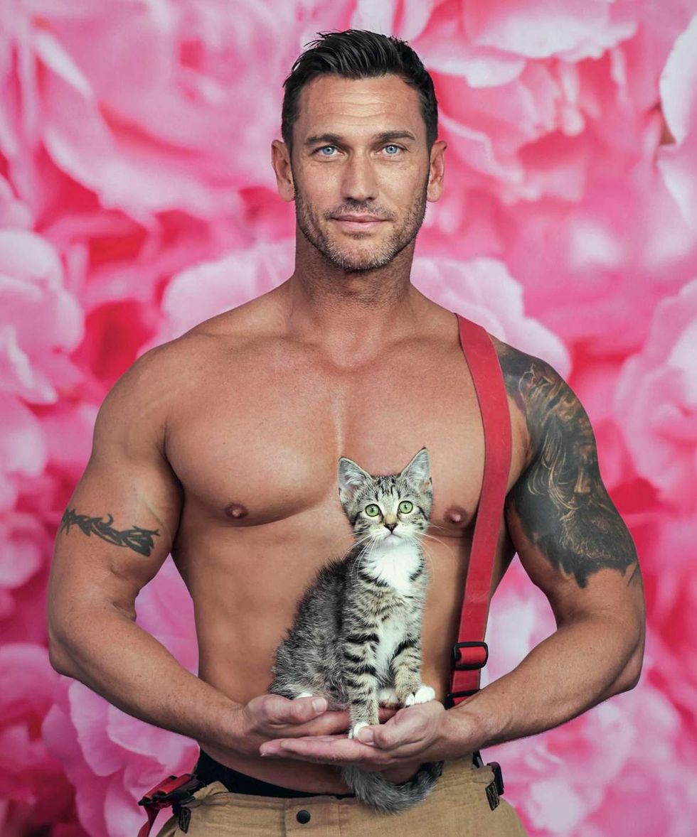 Australian Firefighters 2026 charity calendar sexy men posing with animals