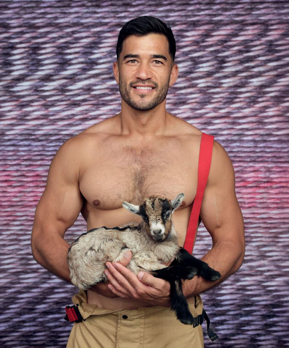 Australian Firefighters 2026 charity calendar sexy men posing with animals