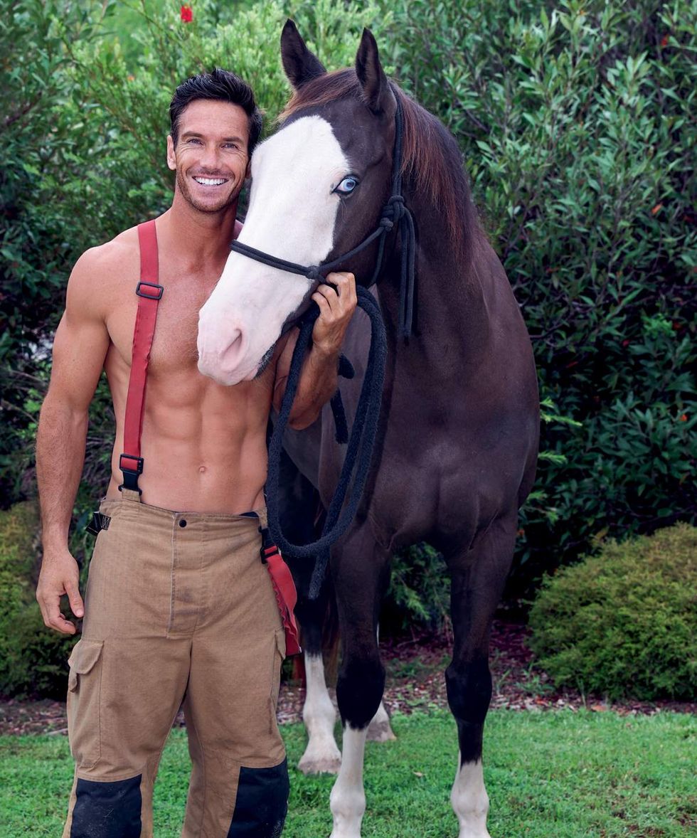 Australian Firefighters 2026 charity calendar sexy men posing with animals