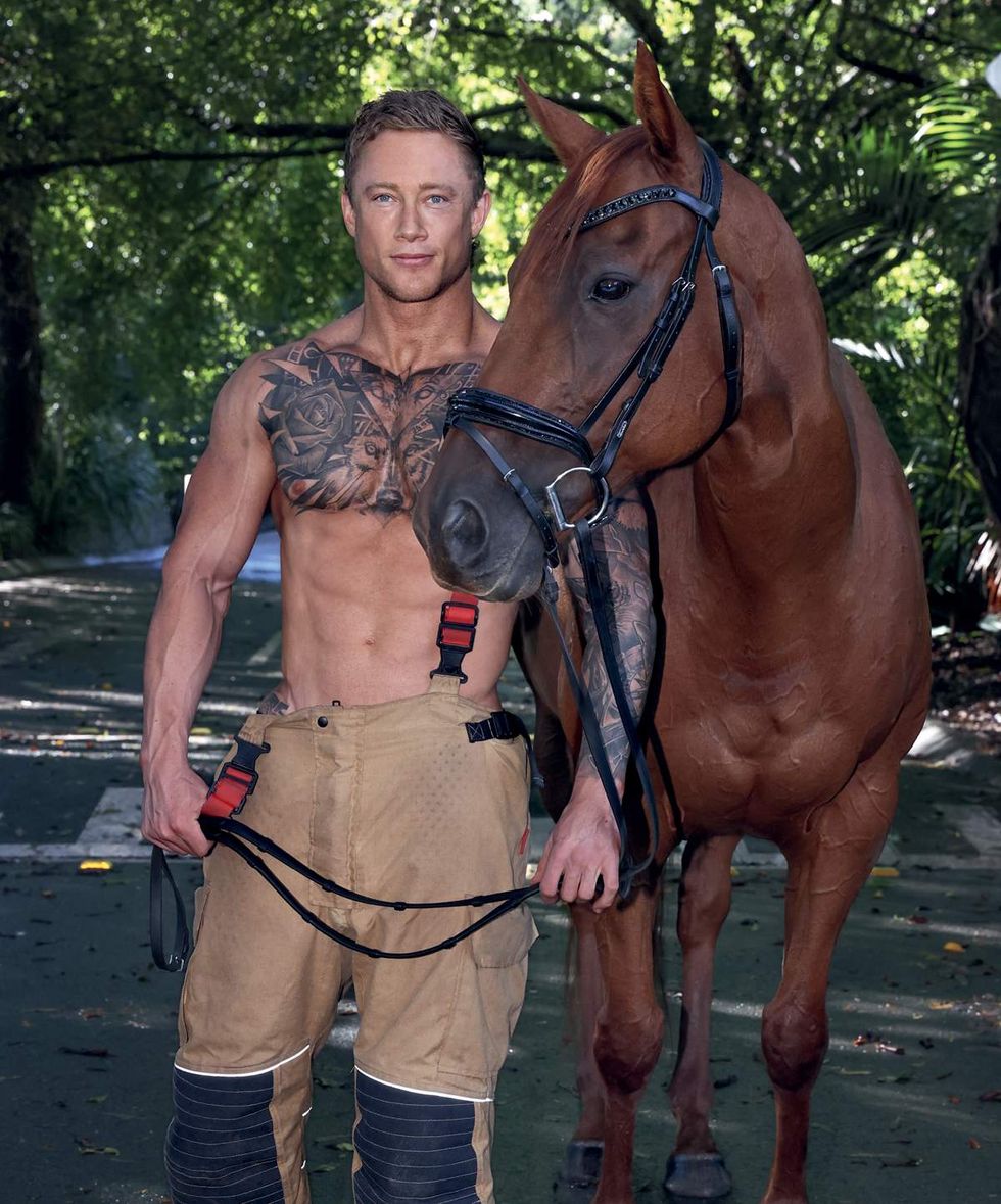 Australian Firefighters 2026 charity calendar sexy men posing with animals