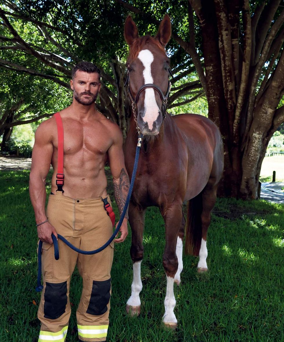 Australian Firefighters 2026 charity calendar sexy men posing with animals