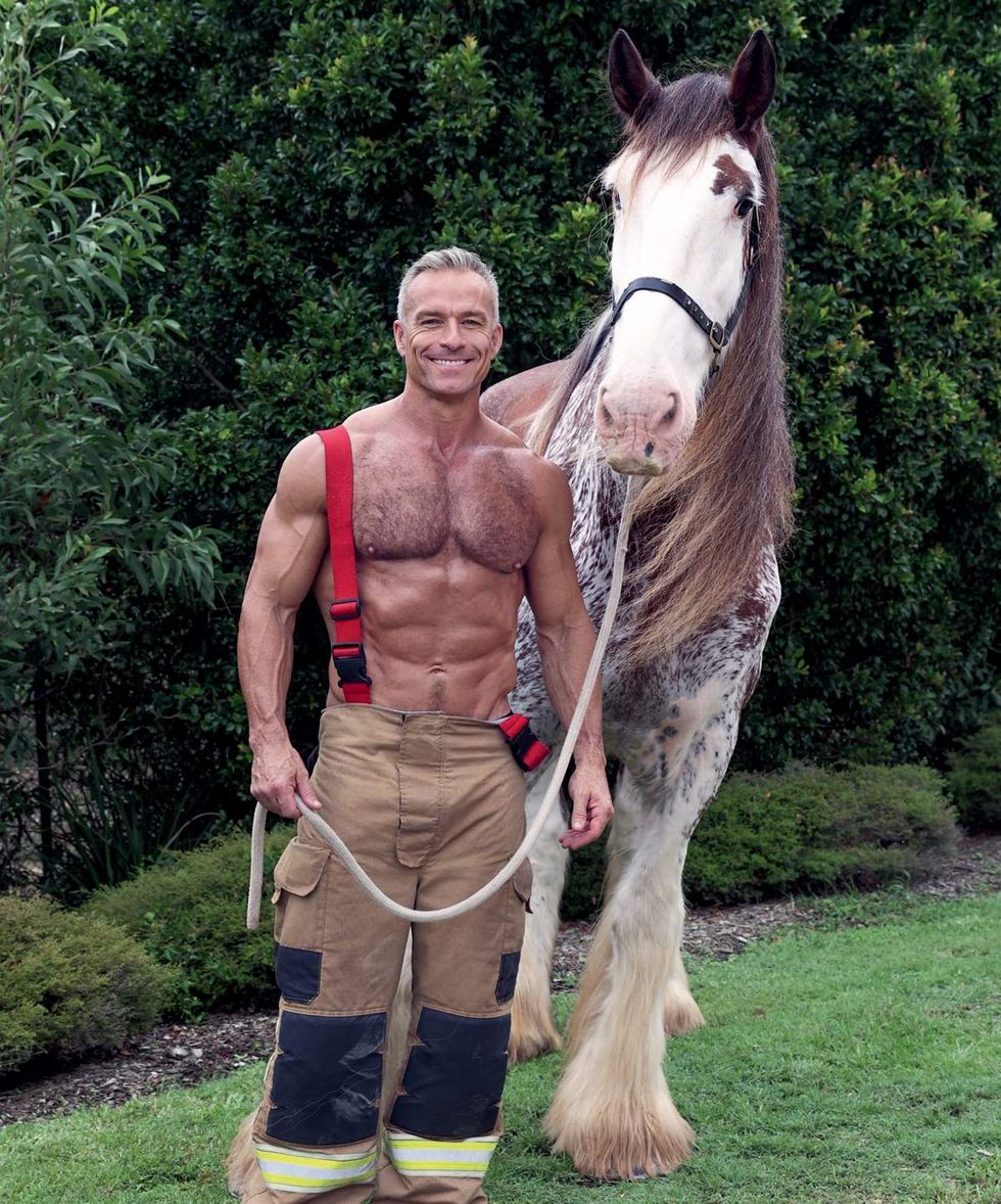 Australian Firefighters 2026 charity calendar sexy men posing with animals