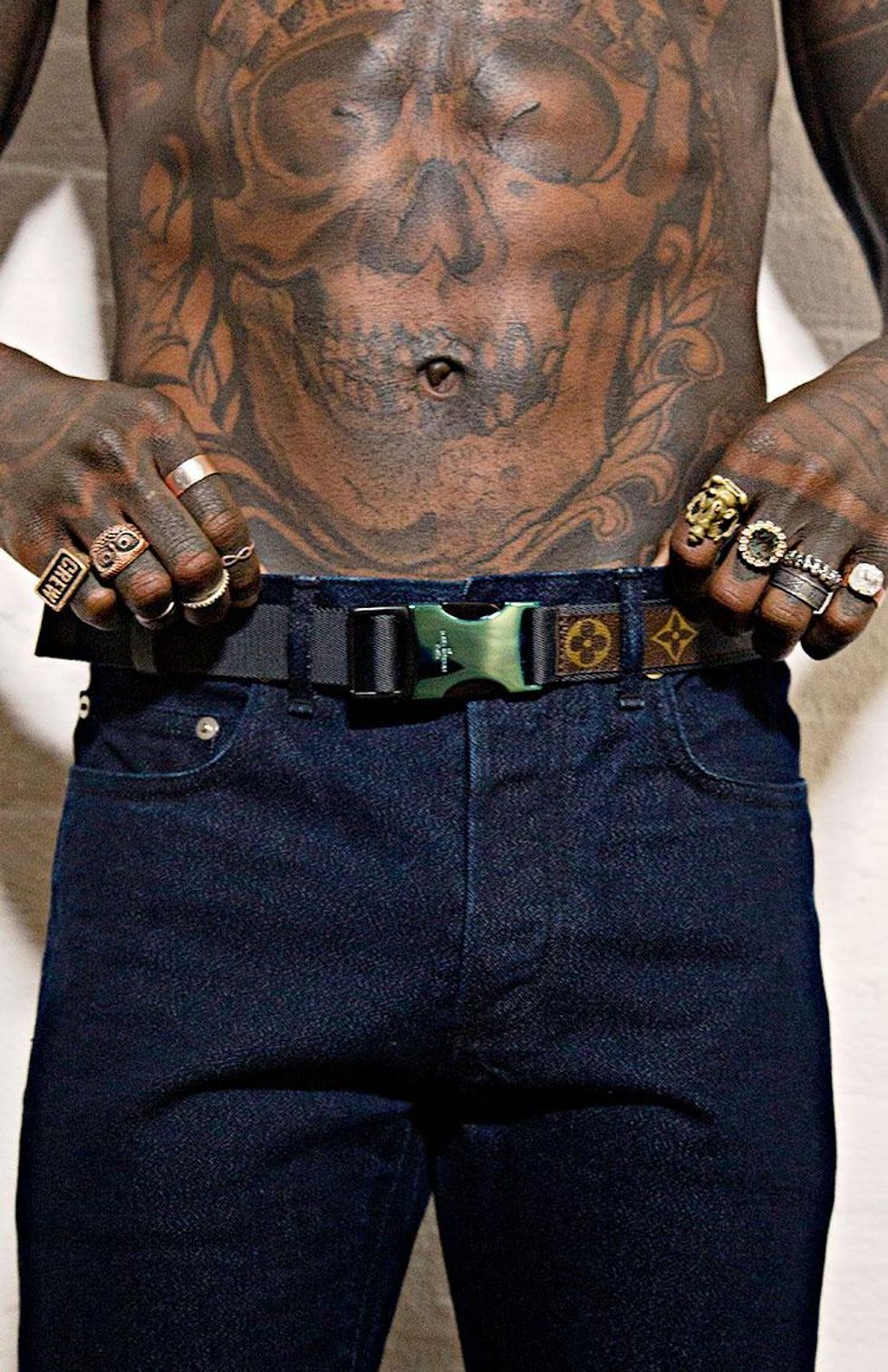 Belt by Louis Vuitton, $635. Jeans (throughout) by Dior Homme, $550