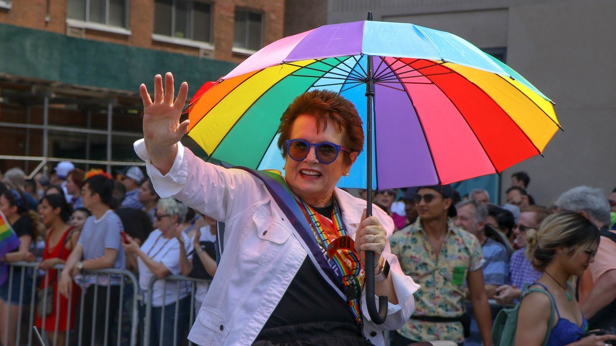 Billie Jean King with rainbow umbrella