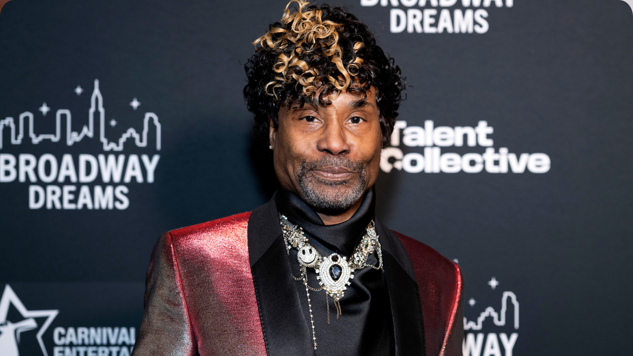 Billy Porter posing on a red carpet