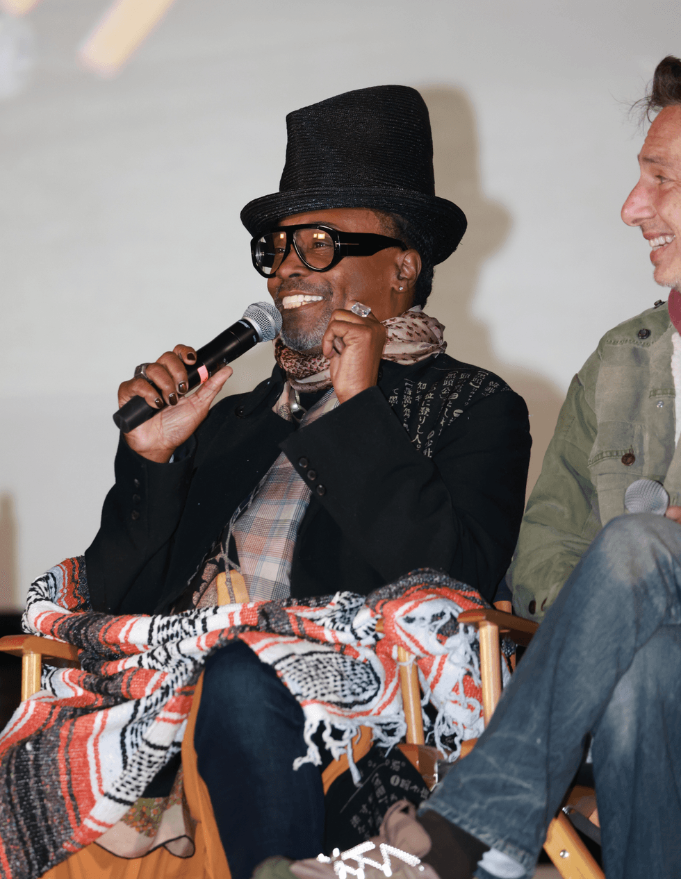 Billy Porter speaks into a microphone during The Broken Hearts Club 25th anniversary screening and panel in West Hollywood