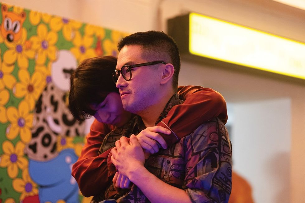 Bowen Yang and Han Gi-Chan in in THE WEDDING BANQUET