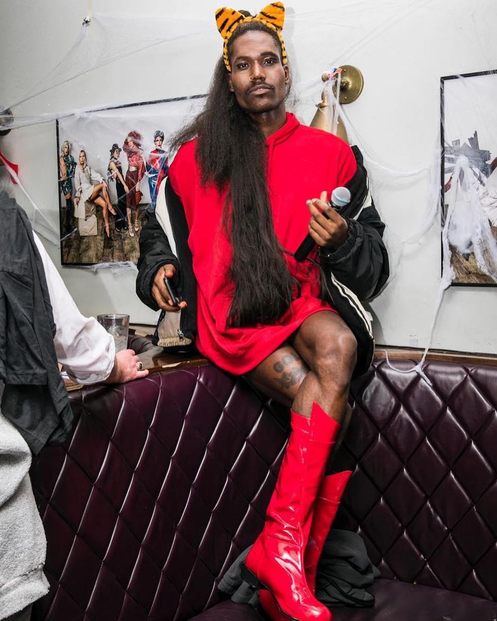 Boy Radio as Ariana Grande