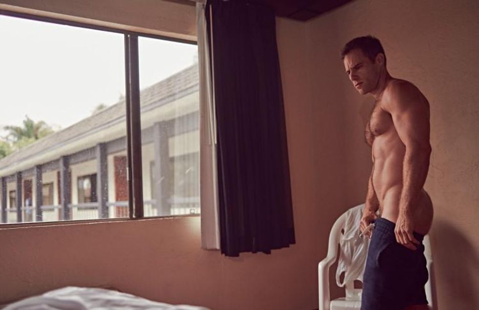 Brian Kaminsky presents Matthew Wilkas in a motel.