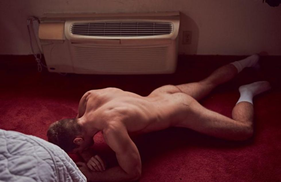 Brian Kaminsky presents Matthew Wilkas in a motel.