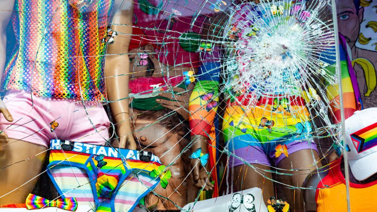 broken window on LGBTQ+ store