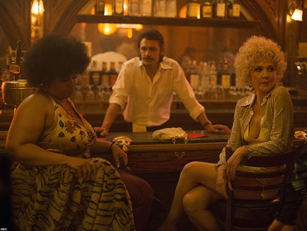 Candy (Maggie Gyllenhaal) and Thunderthighs (Pernell Walker) sit at Vincent Martino's bar in HBO's new series, "The Deuce."