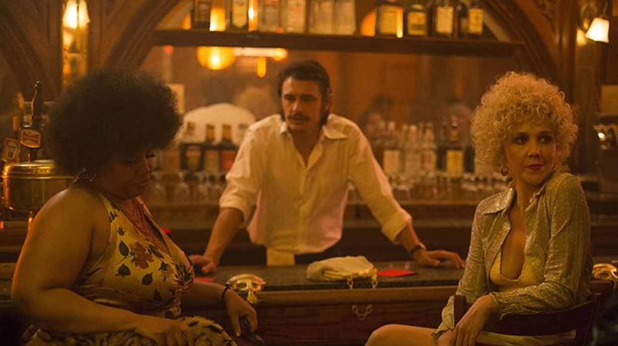 Candy (Maggie Gyllenhaal) and Thunderthighs (Pernell Walker) sit at Vincent Martino's bar in HBO's new series, "The Deuce."