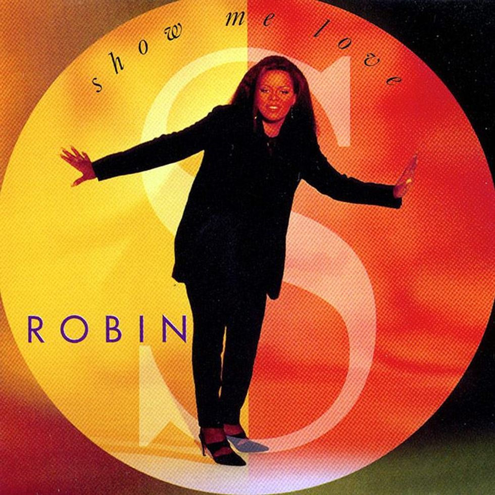 Cardigan, $1,180, and Shirt, $260 (3 pack), by Prada; Pants, $950, by Bottega Veneta.