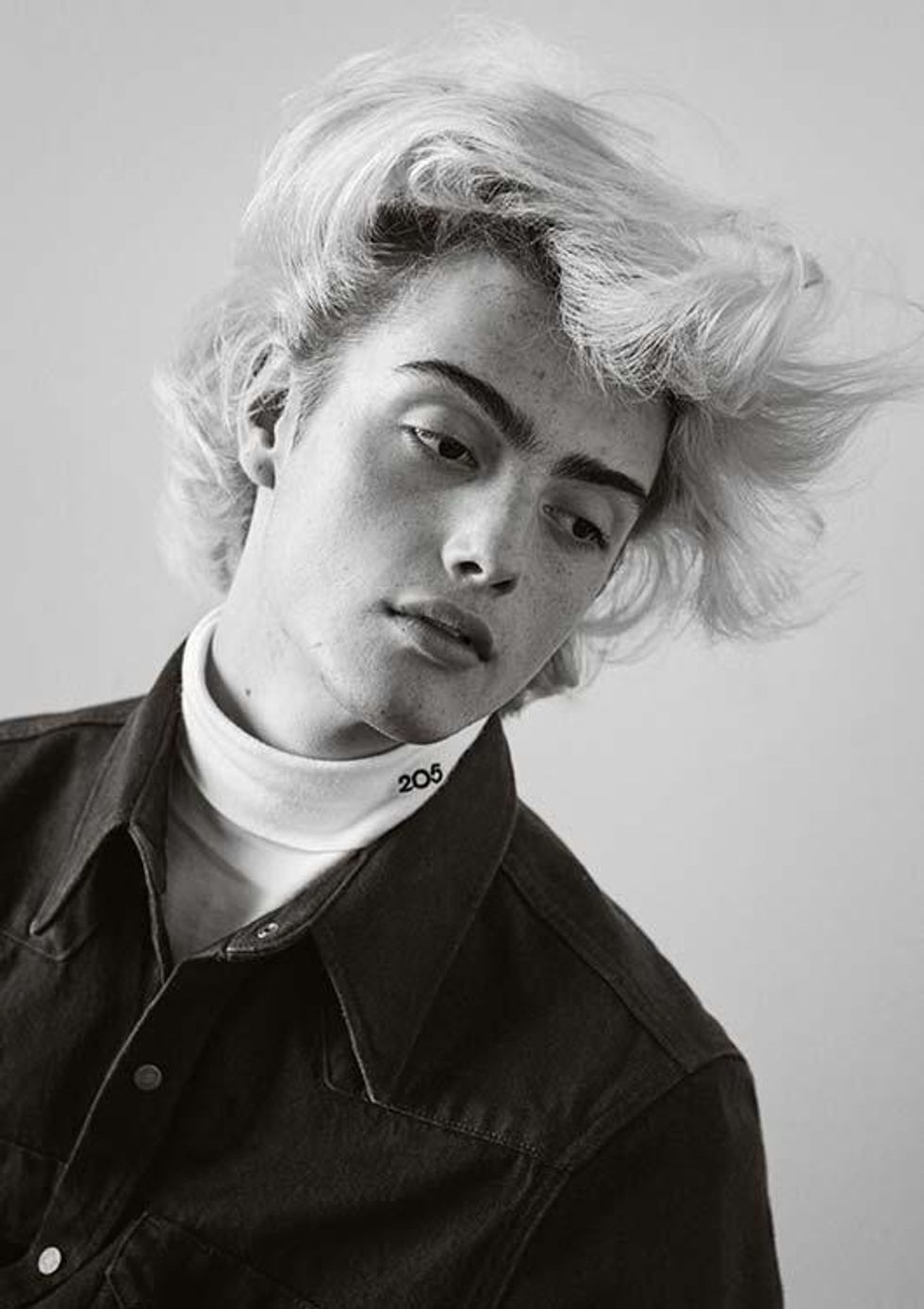 Casil McArthur (Shirt by Calvin Klein Jeans Established 1978, Turtleneck by Calvin Klein)