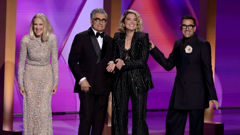 Catherine O'Hara, Eugene Levy, Annie Murphy, and Dan Levy speak onstage during the 76th Primetime Emmy Awards at Peacock Theater on September 15, 2024 in Los Angeles, California.