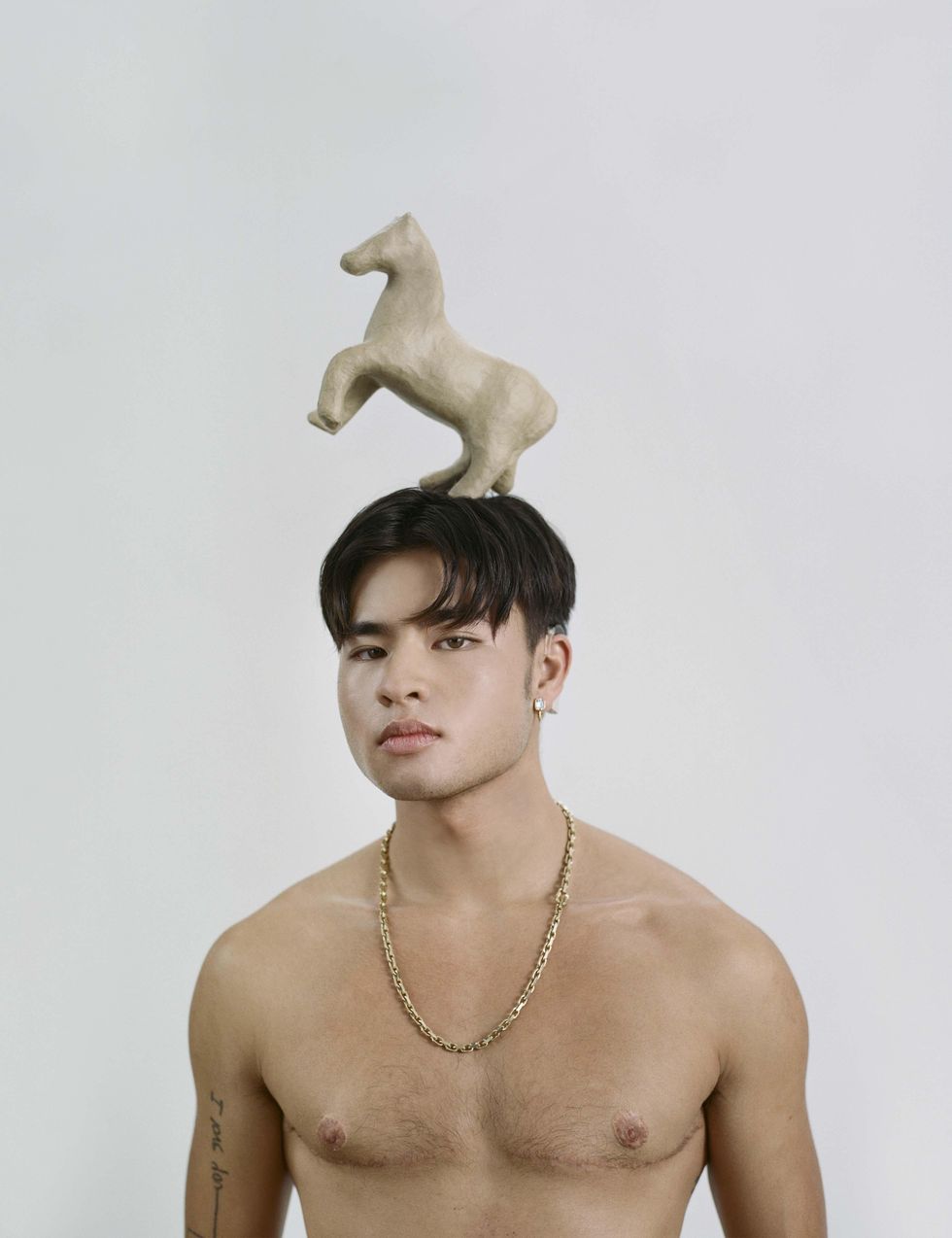 Chella Man in a cover story for Out Magazine February 2020