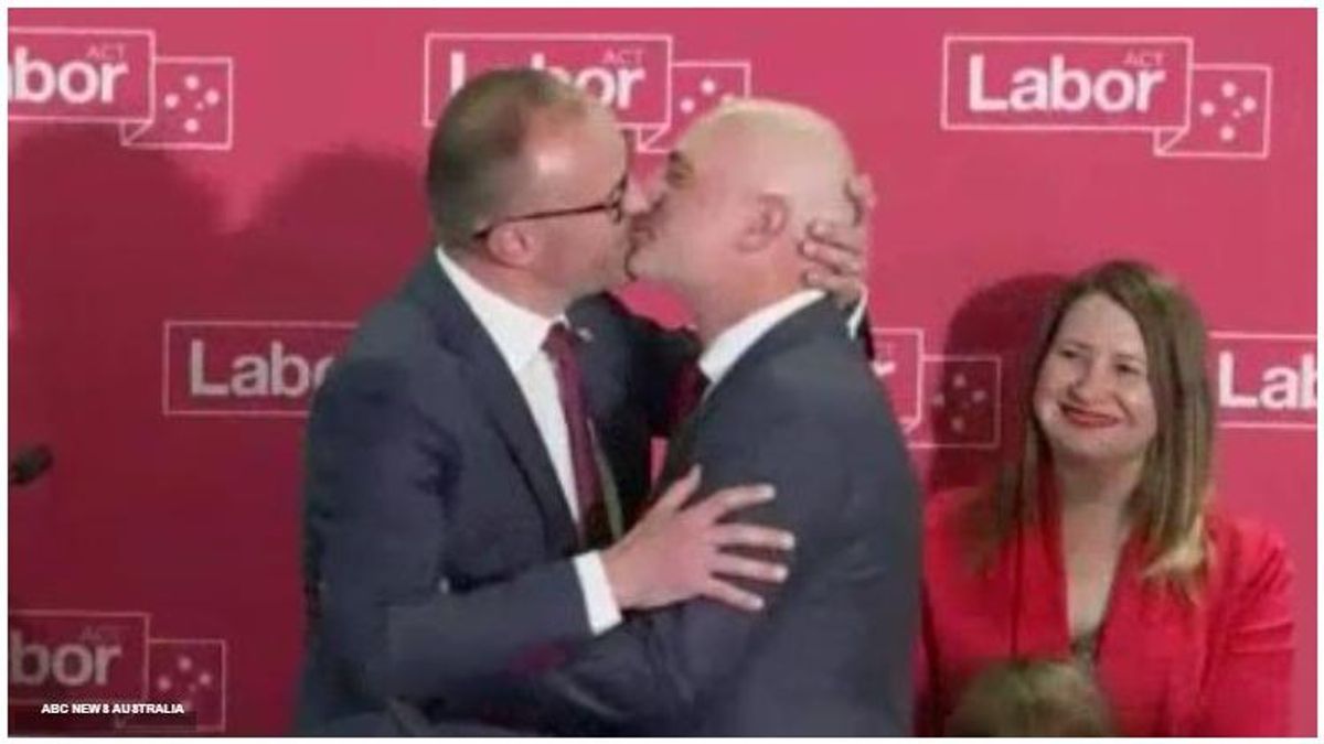 Chief Minister Andrew Barr celebrates 6th consecutive victory and four more years of Labour government by kissing his husband on stage.